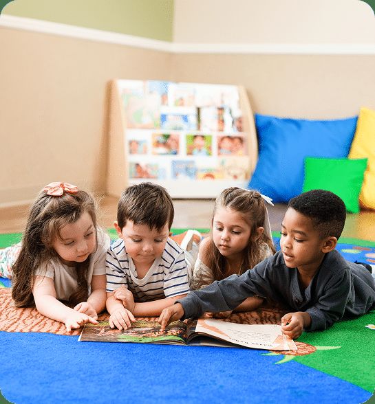 Children reading together at Lightbridge Academy
